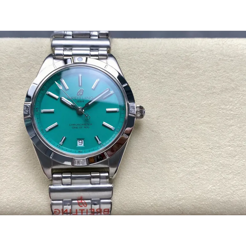 Breitling Chronomat Women's A103801A1L1A1 Replica - Turquoise Dial Fluted Bezel